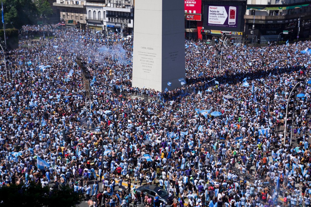 Argentine soccer fans celebrate their team's World Cup victory over France, in Buenos Aires, Argentina,