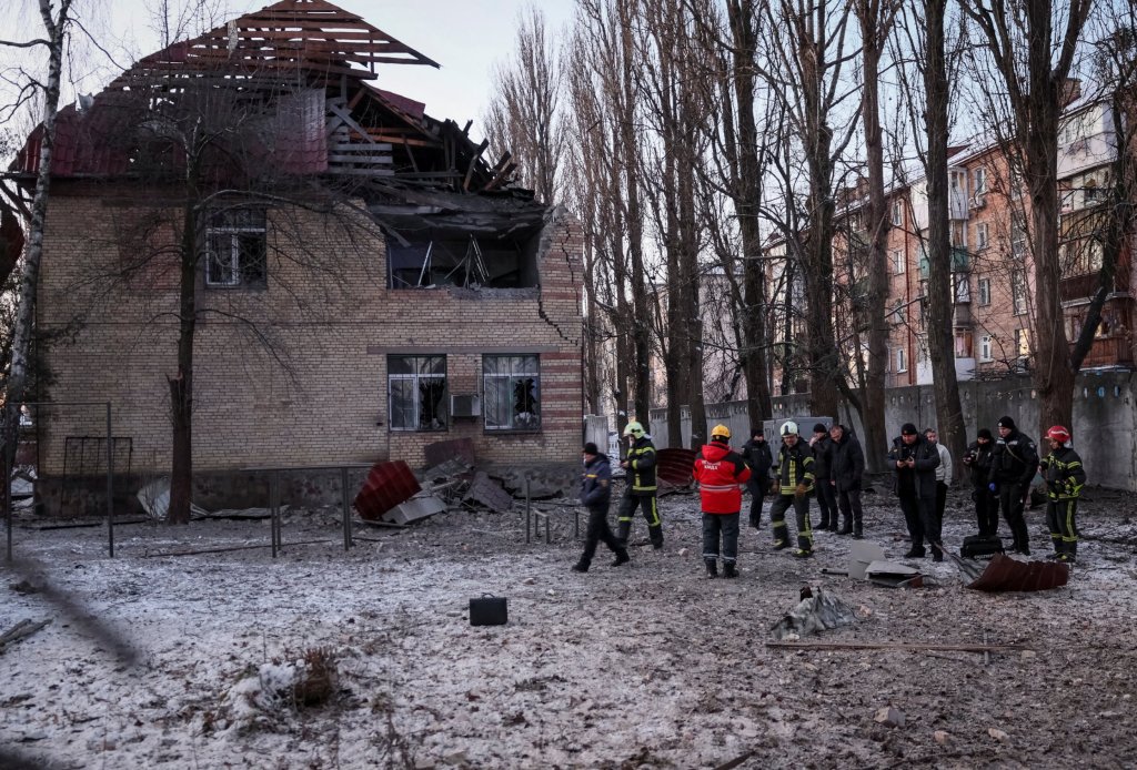 Rescuers and cops read about portions of the drone on the site of a development destroyed via a Russian drone assault, as their assault on Ukraine continues, in Kyiv, Ukraine December 14, 2022.</body></html>” /></div>
<p>REUTERS/Gleb Garanich”/>Govt and local officers say the city’s defence methods struck down greater than a dozen drones (Picture: Reuters) </p>
<div><img loading=
