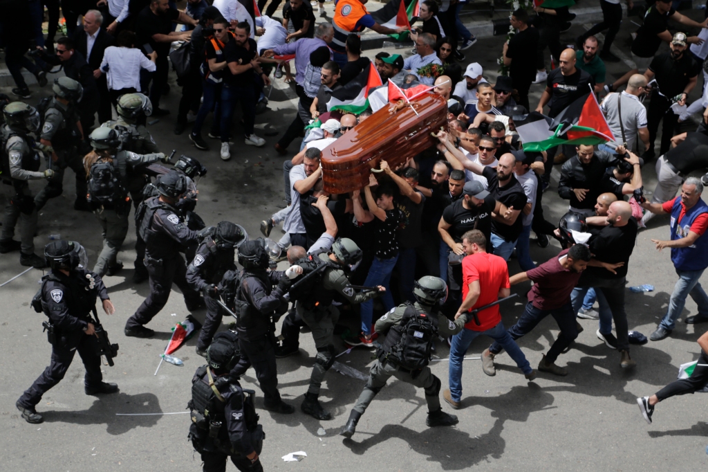 Israeli police encompass a group of Palestinian pallbearers, who are sporting the coffin of killed journalist Shireen Abu Akleh.</body></html>” /></div>
<p>At The time, the IDF claimed Palestinian fireplace had killed Abu Akleh, but later investigations via a few news retailers discovered the shot was more likely to have come from Israeli forces. The IDF typical accountability but stated it used to be unintended, and rejected a US probe into Abu Akleh’s tragic loss of life. On her funeral days after the taking pictures, Israeli police attacked pallbearers as seen on this photograph – Christian leaders in the region condemned the police’s behaviour as ‘unjustified’. (Image: <strong>AP Photograph/Maya Levin</strong>) </p>
<div><img loading=