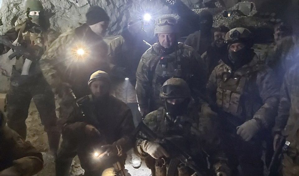 Russian mercenary group Wagner pose for a picture believed to be in a salt mine in Soledar