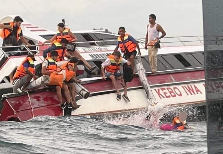 Terrified Bali tourists are forced to leap into the ocean from a sinking boat as wild waters overwhelm the vessel: 'This is next level'