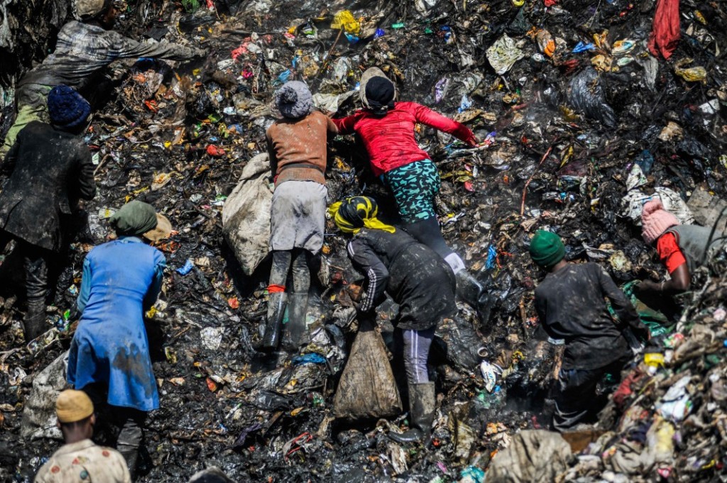 People rummage through the mountain-like rubbish dump in Dandora, which receives more than 2,000 metric tonnes of waste from the capital city’s 4.5 million residents every day