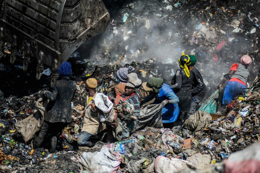 People rummage through the mountain-like rubbish dump in Dandora, which receives more than 2,000 metric tonnes of waste from the capital city’s 4.5 million residents every day