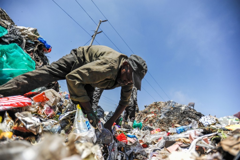 A man rummages through the rubbish dump in Dandora, which receives more than 2,000 metric tonnes of waste from the capital city’s 4.5 million residents every day