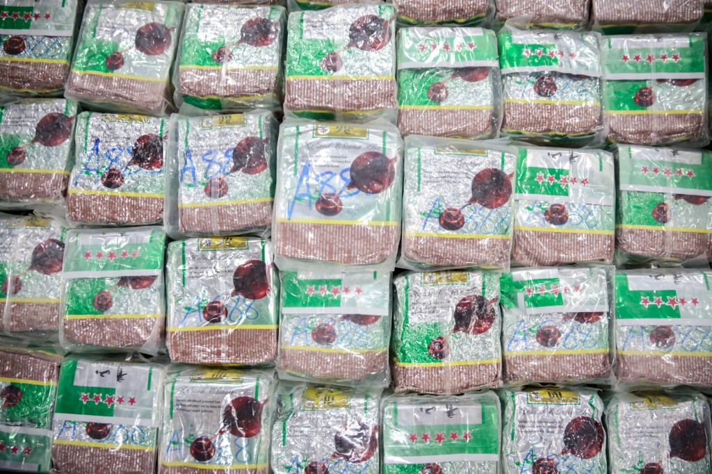 Seized crystal methamphetamine hidden inside tea bags are seen during a news conference at the Office of the Narcotics Control Board in Bangkok, Thailand, January 24, 2023. REUTERS/Napat Wesshasartar