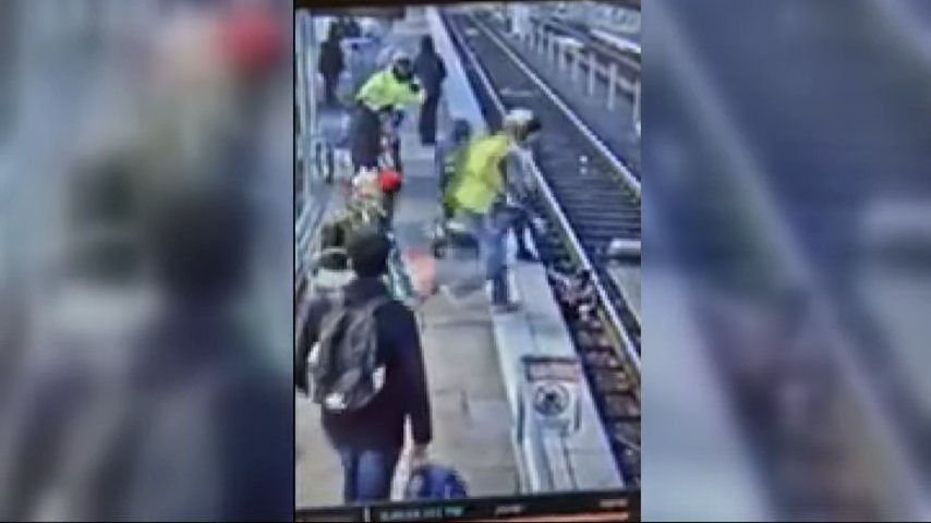 Woman pushes three-year-old girl 'face first' onto train tracks in horror attack