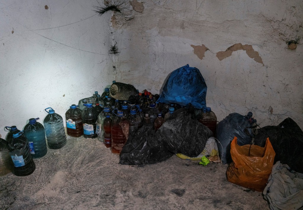 Human excrements are seen inside a basement of an office building, where prosecutors say 30 people were held two months during a Russian occupation, amid Russia's attack on Ukraine, in Kherson, Ukraine, December 10, 2022. REUTERS/Anna Voitenko