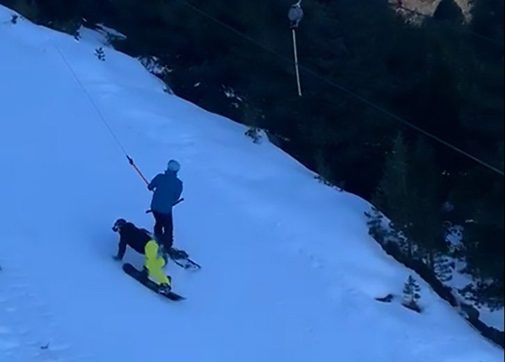 Uncleared Grabs: Snowboarder arrested after falling down access slope