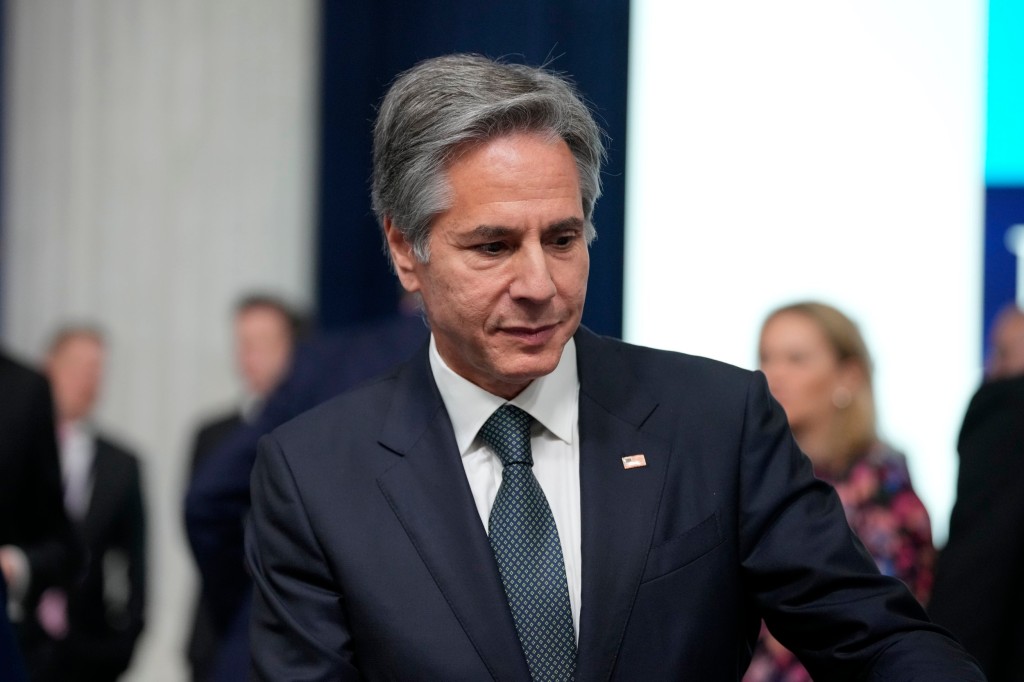 United States Secretary of State Antony Blinken stands during the first day of the meeting of NATO Ministers of Foreign Affairs, in Bucharest, Romania, Tuesday, Nov. 29, 2022. (AP Photo/Andreea Alexandru)