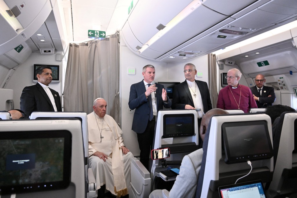 The Pope and Archbishop were joined by the Church of Scotland's Dr Iain Greenshields, second right (Picture: Reuters)