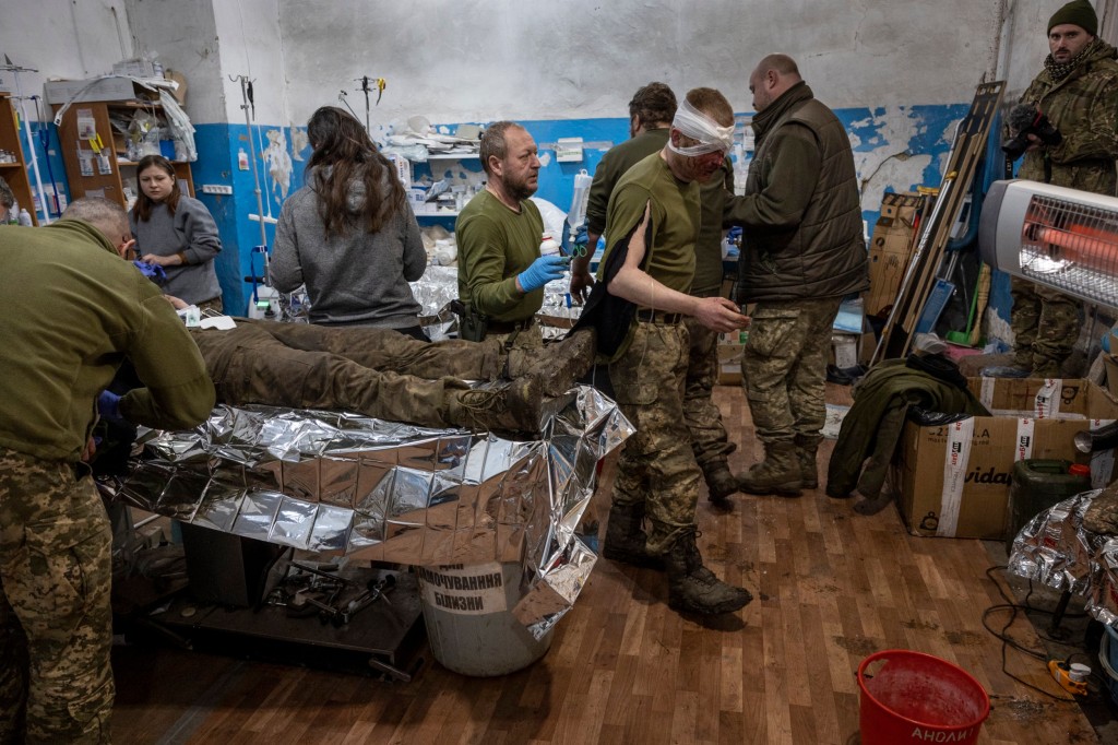 *** BESTPIX *** DONBAS, EASTERN UKRAINE - FEBRUARY 22: Medical personnel from Ukraine's 72nd Mechanized Brigade treat soldiers at a stabilization hospital near the frontline on February 22, 2023 in the Donbas region of eastern Ukraine. Heavy fighting continues in Donbas, as Russian forces press a winter offensive ahead of February 24, which marks a year since the invasion of Ukraine. (Photo by John Moore/Getty Images)