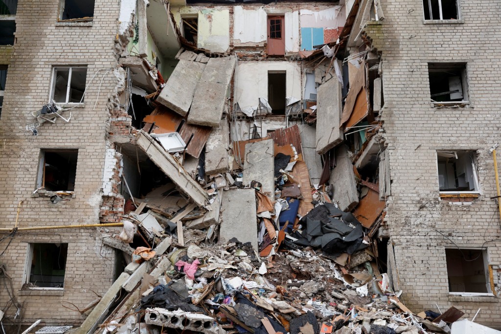 An apartment block destroyed by a missile strike is seen, as Russia's attack on Ukraine continues, from the frontline Donbas city of Bakhmut, Ukraine, January 5, 2023. REUTERS/Clodagh Kilcoyne