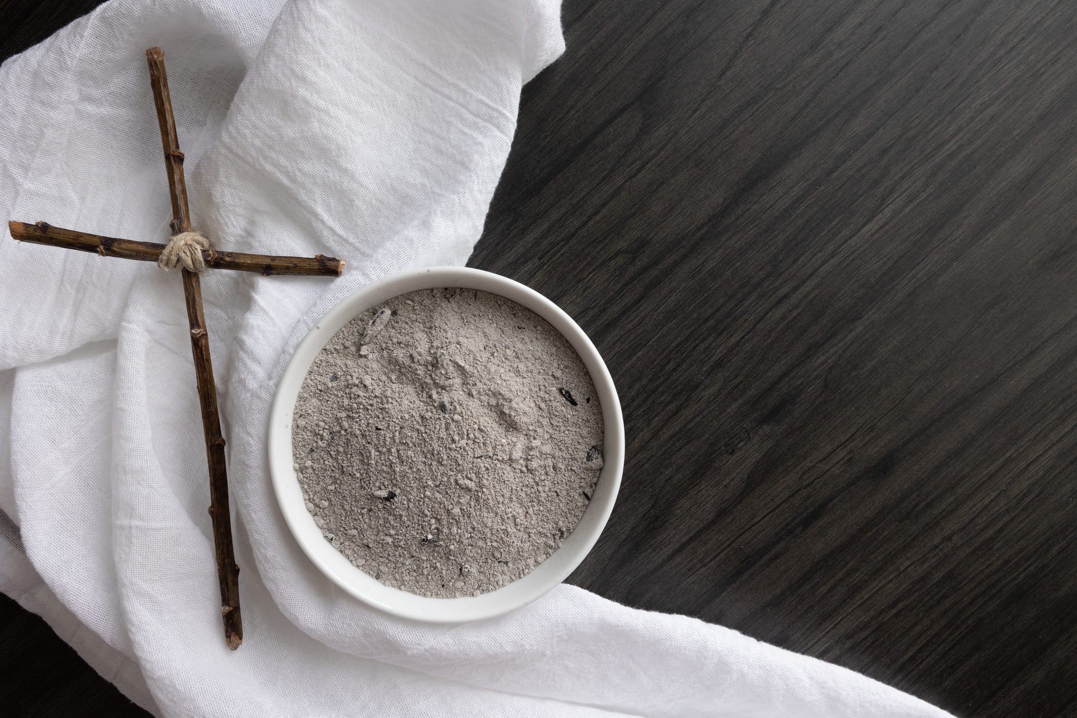 Cross and a bowl of Ash, to represent Ash Wednesday