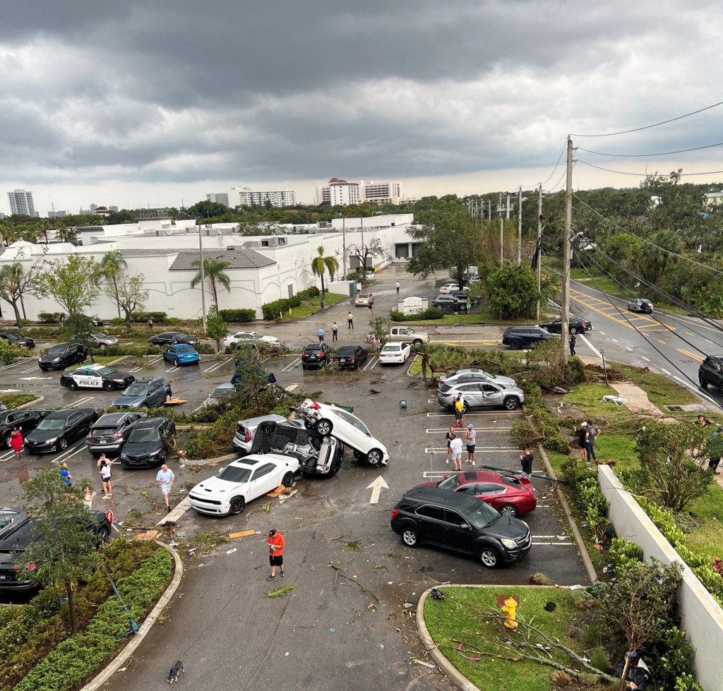 View of vehicles piled up at a parking lot following a suspected tornado, in Palm Beach Gardens, Florida, U.S., April 29, 2023 in this picture obtained from social media. Spencer Caesare/via REUTERS THIS IMAGE HAS BEEN SUPPLIED BY A THIRD PARTY. MANDATORY CREDIT. NO RESALES. NO ARCHIVES.