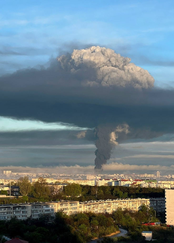 A view shows smoke rising following an alleged drone attack in Sevastopol, Crimea, April 29, 2023. REUTERS/Stringer